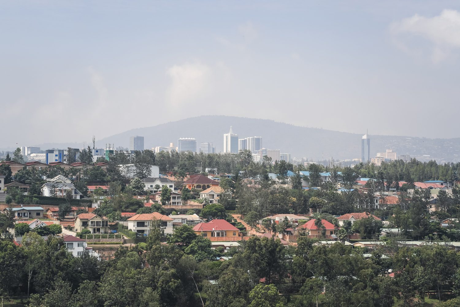 The Kigali city skyline rising above the hills of the capital